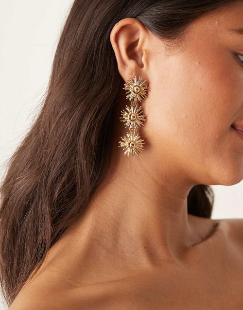 Sun earrings with triple drop detail in gold tone