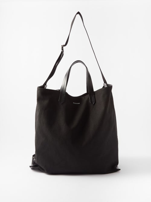 Large black tote bag with Tape logo