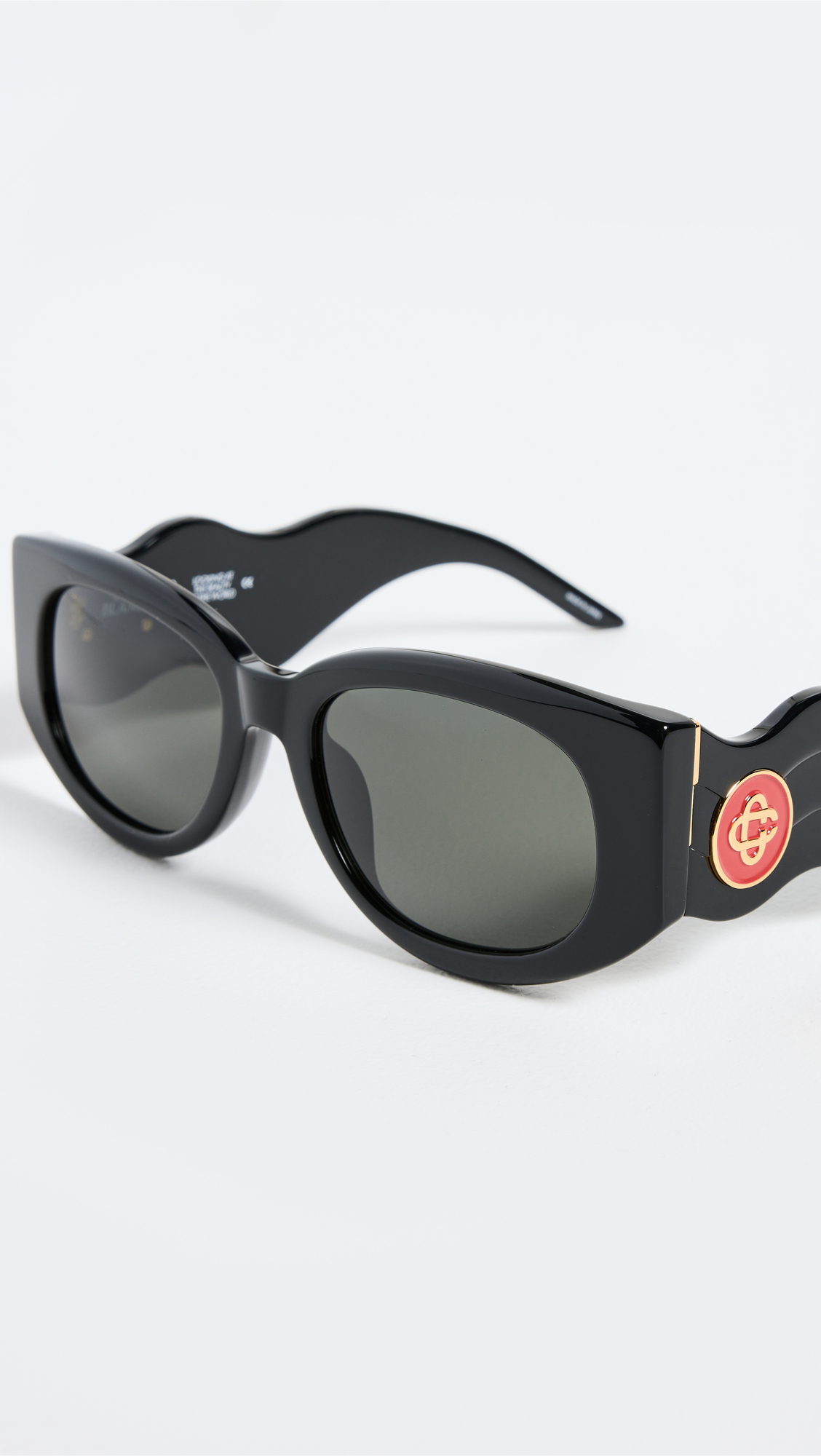 Casablanca Acetate Metal Oval Wave Sunglasses - Realry: A global