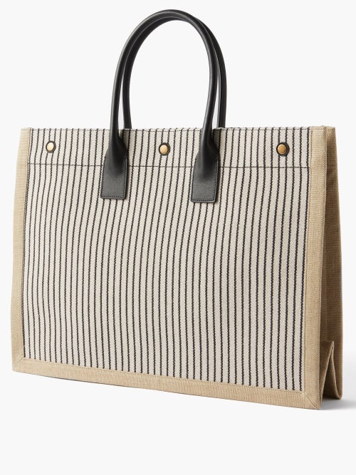 RIVE GAUCHE BUCKET BAG IN STRIPED CANVAS AND LEATHER