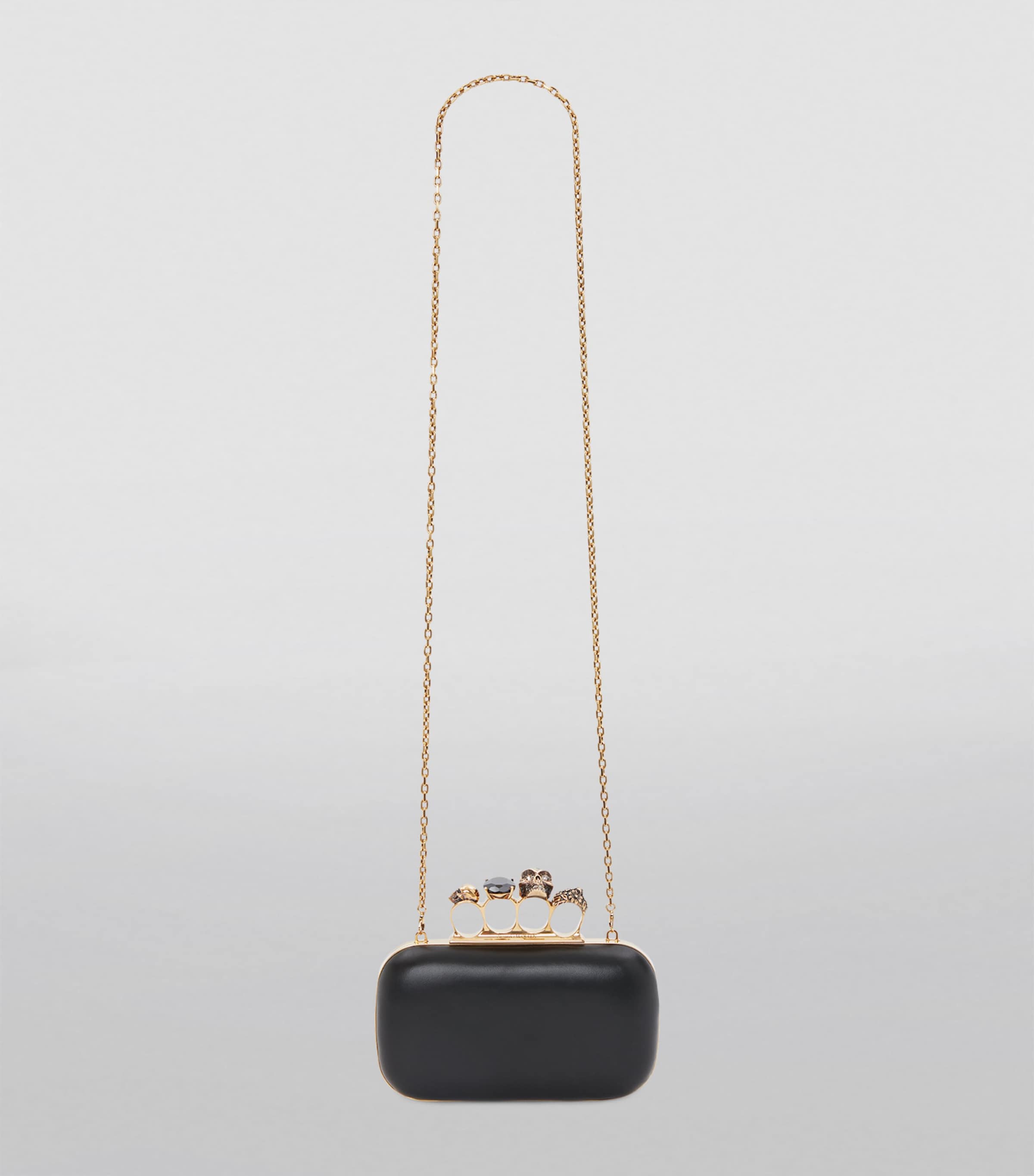 Skull Four-Ring Clutch Bag