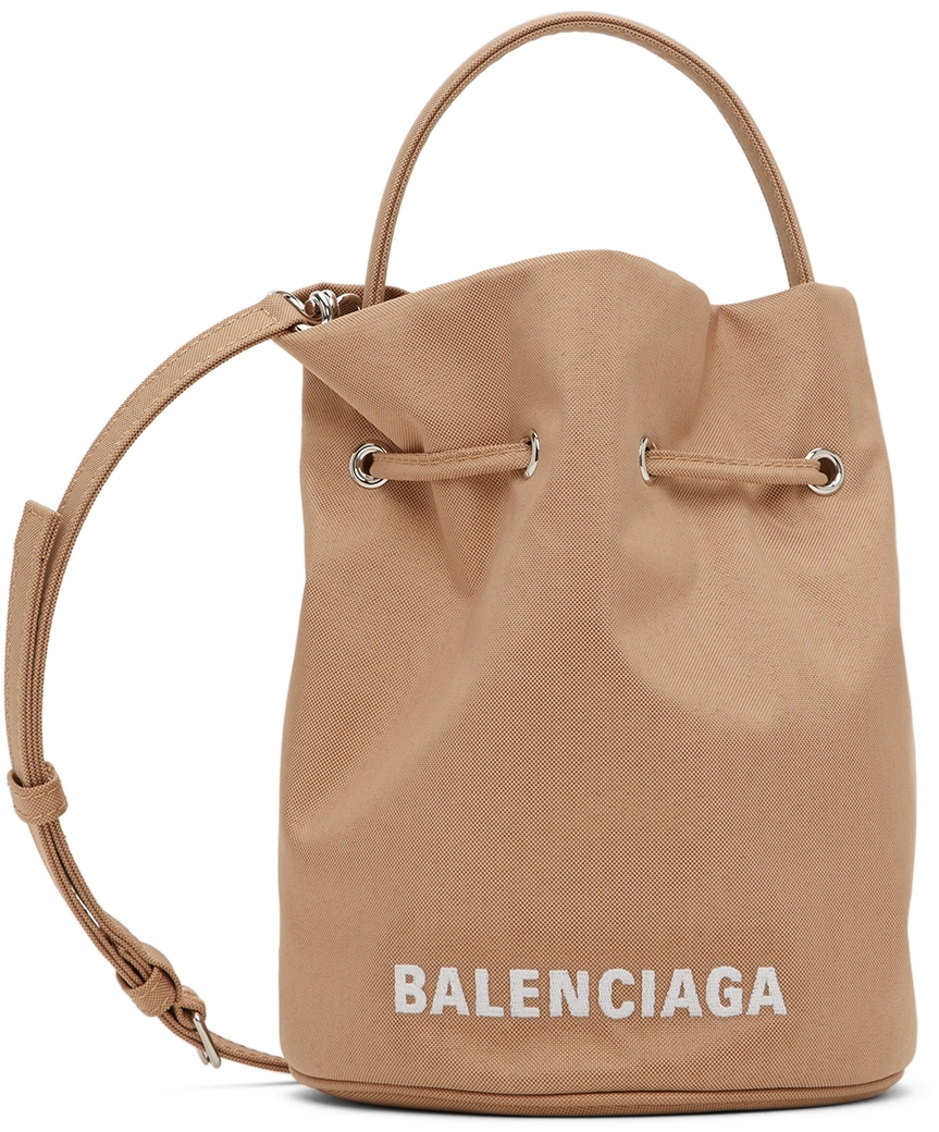 Balenciaga Beige XS Wheel Drawstring Bucket Bag - Realry: A global fashion  sites aggregator