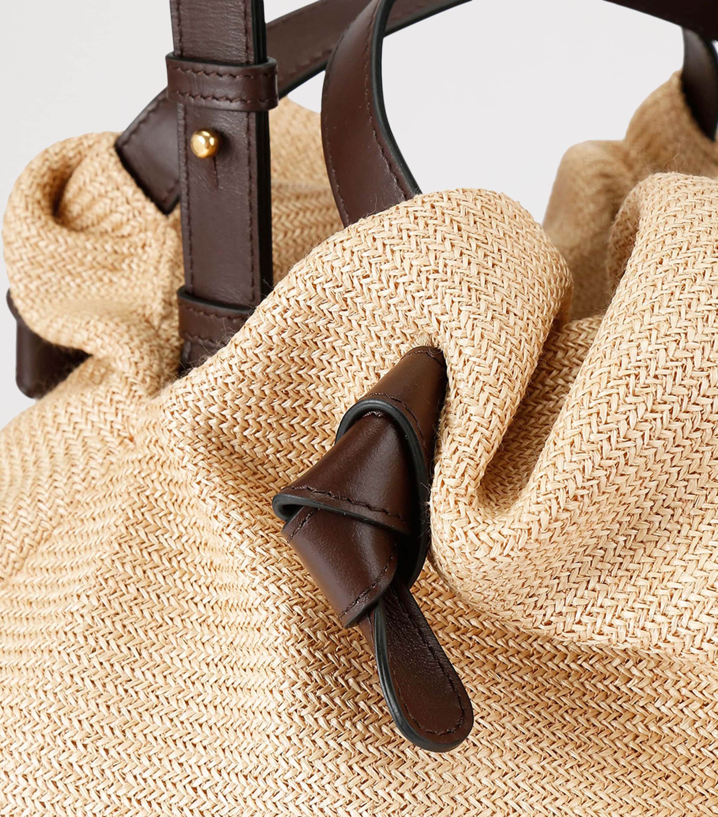 Raffia Taurus Dumpling Top-Handle Bag